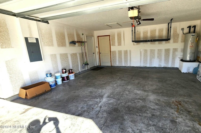 garage featuring electric panel, water heater, and a garage door opener