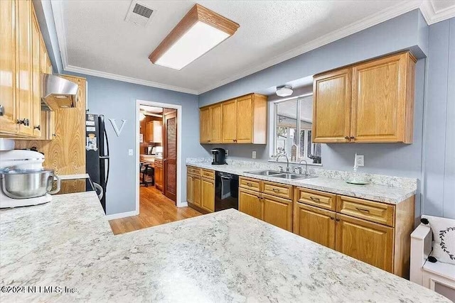 kitchen with black appliances, sink, light hardwood / wood-style flooring, ornamental molding, and a textured ceiling