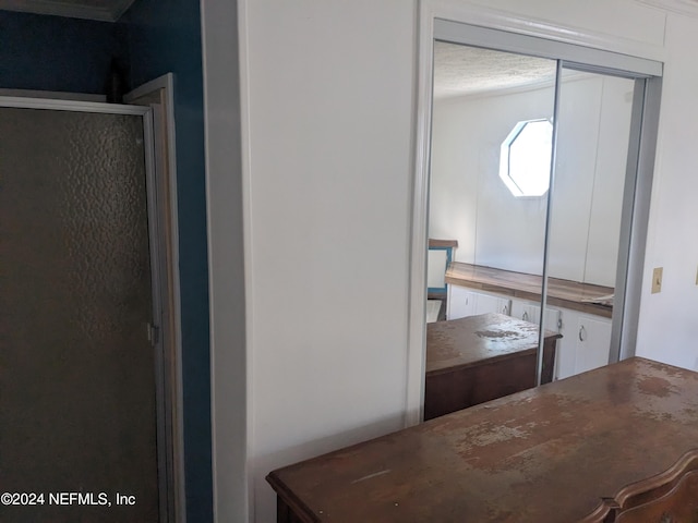 bathroom with a textured ceiling