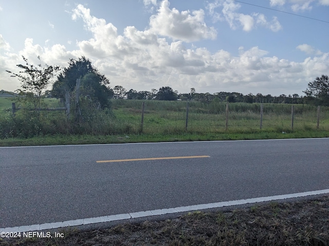 exterior space with a rural view