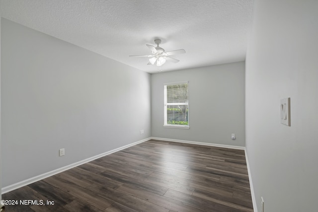 unfurnished room featuring a textured ceiling, dark hardwood / wood-style flooring, and ceiling fan