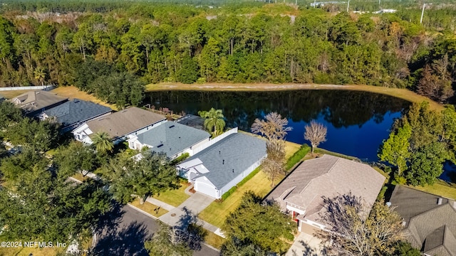 bird's eye view with a water view