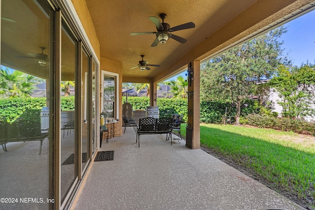 view of patio / terrace featuring ceiling fan