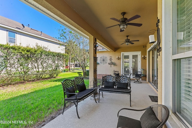 view of patio with ceiling fan and french doors