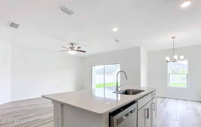 kitchen with dishwasher, a center island with sink, light hardwood / wood-style flooring, and sink