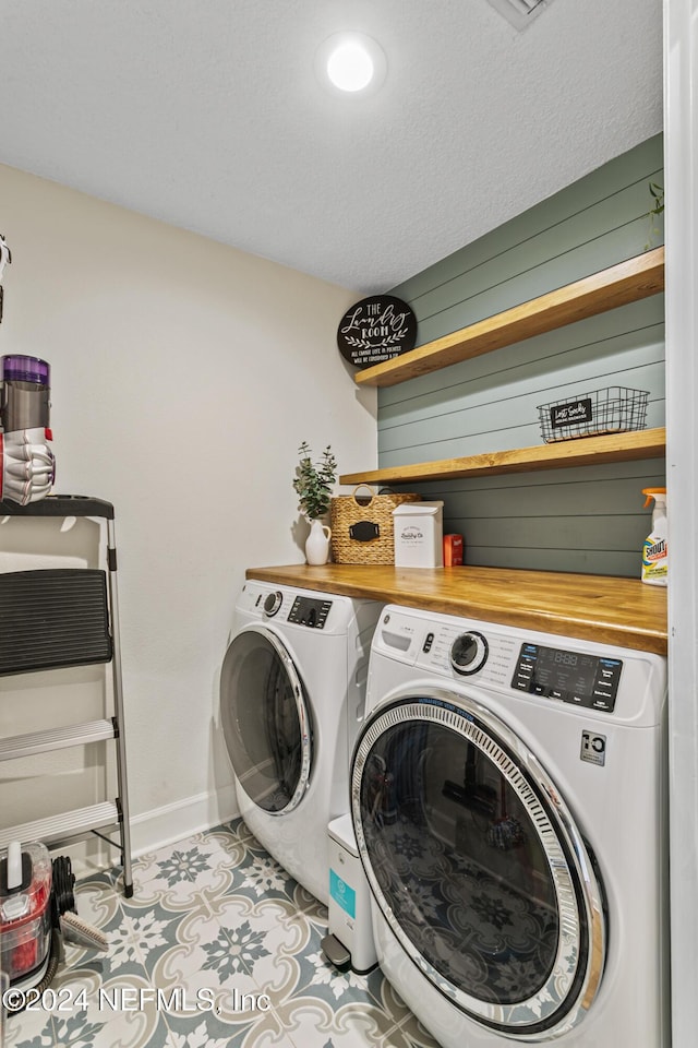 415 N Ocean Grande Dr Unit 101, Ponte Vedra Beach, FL 32082 - washroom featuring separate washer and dryer and baseboards