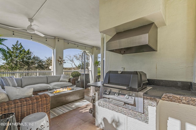 415 N Ocean Grande Dr Unit 101, Ponte Vedra Beach, FL 32082 - view of patio with an outdoor living space with a fire pit and ceiling fan