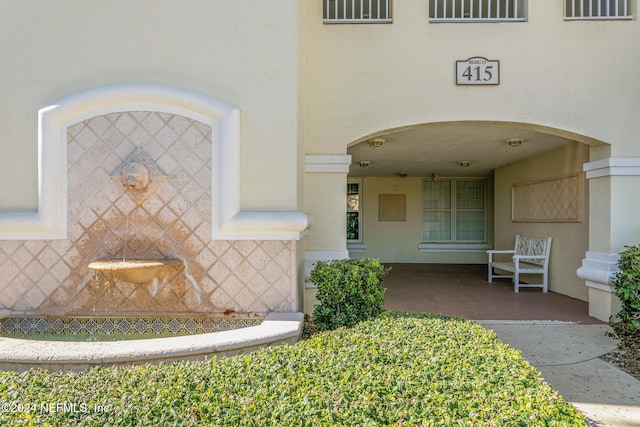 415 N Ocean Grande Dr Unit 101, Ponte Vedra Beach, FL 32082 - view of exterior entry with stucco siding