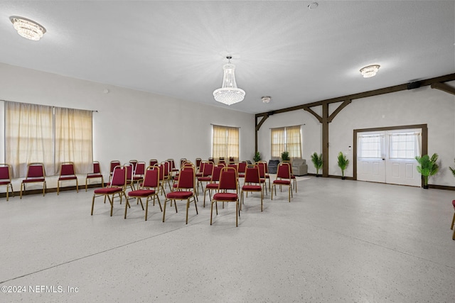 dining space featuring a chandelier