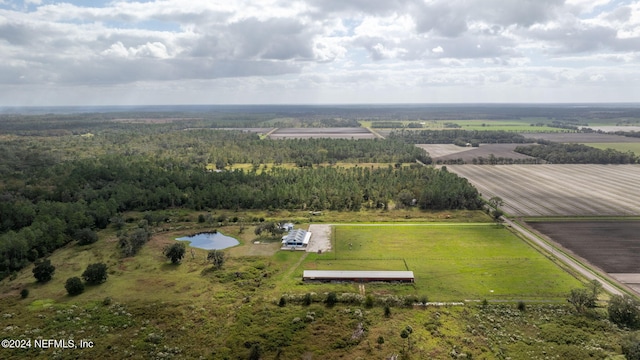 birds eye view of property featuring a rural view