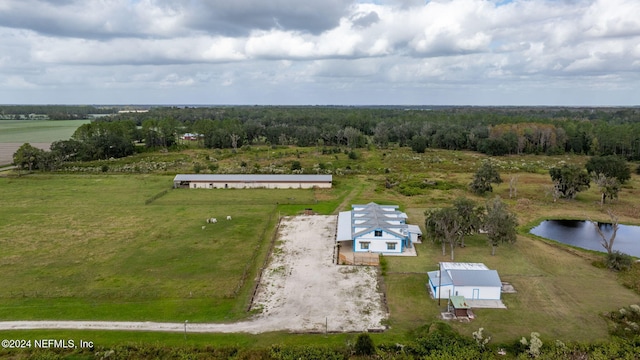 aerial view with a rural view and a water view