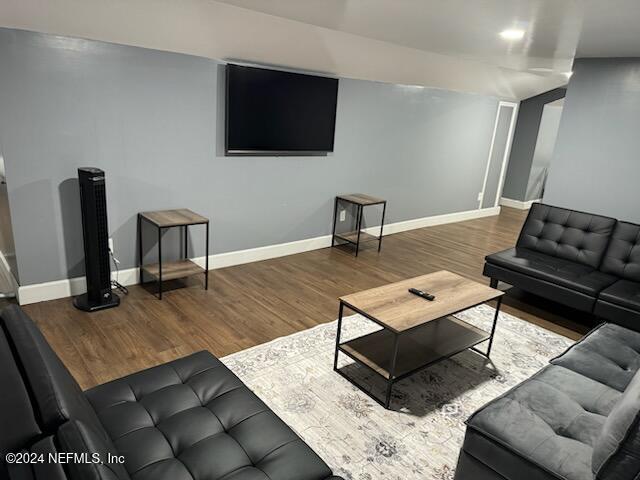 living room featuring wood-type flooring