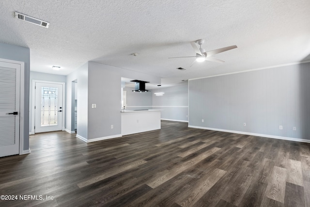 unfurnished living room featuring a textured ceiling, ceiling fan, and dark wood-type flooring