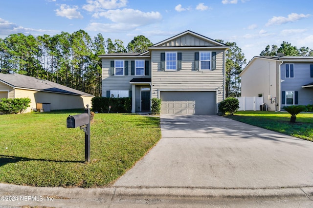 front of property with a front yard and a garage