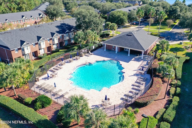 view of swimming pool with a patio area