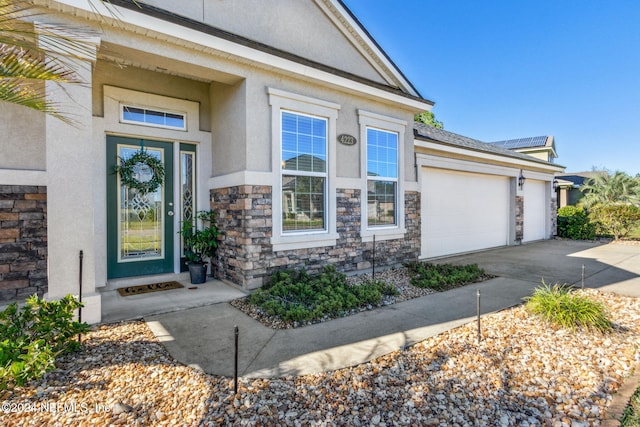 property entrance featuring a garage