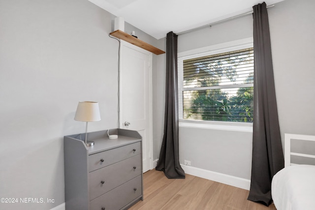 bedroom with light hardwood / wood-style floors