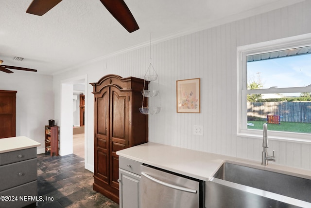 kitchen with ornamental molding, ceiling fan, dark wood-type flooring, sink, and dishwasher