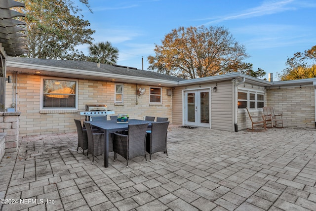 view of patio with french doors and grilling area