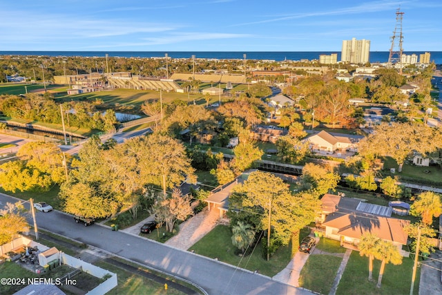 birds eye view of property featuring a water view