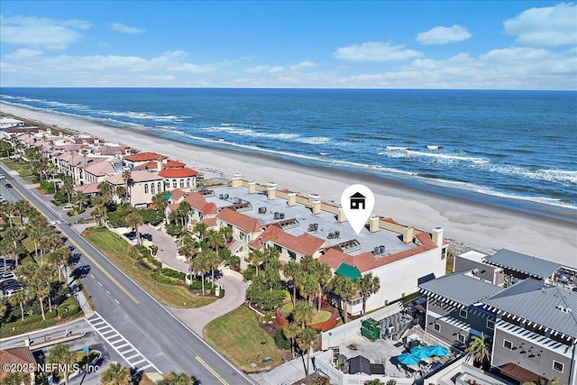 aerial view with a beach view and a water view