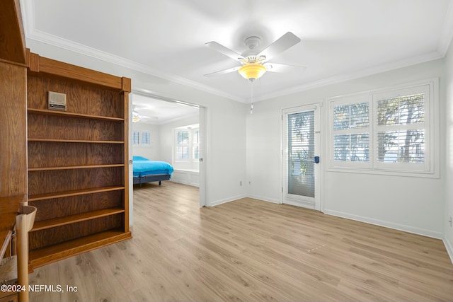 interior space featuring crown molding, ceiling fan, and light hardwood / wood-style floors