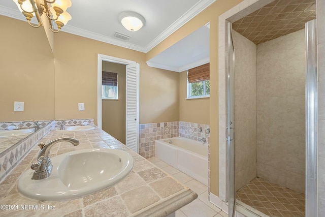 bathroom featuring sink, tile patterned flooring, and ornamental molding