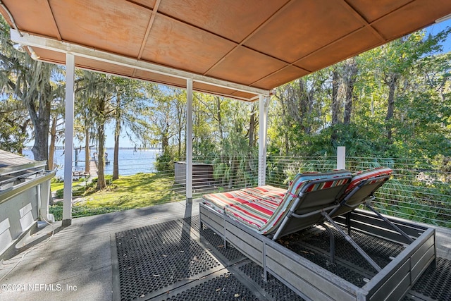 view of patio featuring a water view