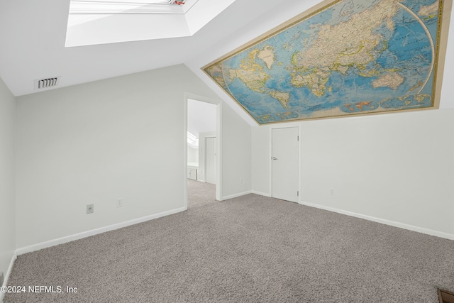 bonus room featuring carpet flooring and vaulted ceiling