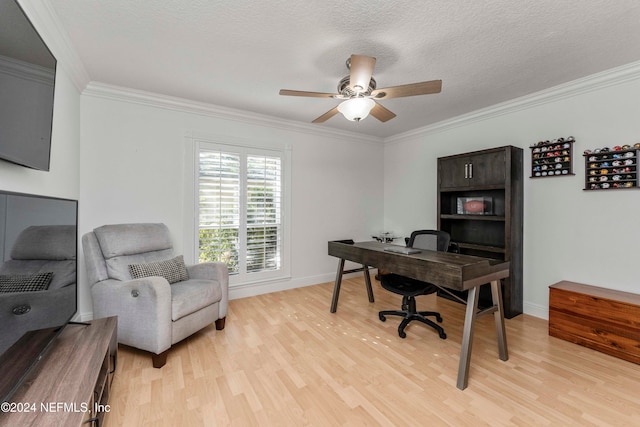 office featuring ceiling fan, light hardwood / wood-style flooring, a textured ceiling, and ornamental molding