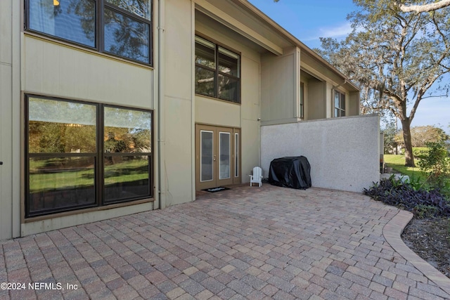 view of patio with grilling area and french doors