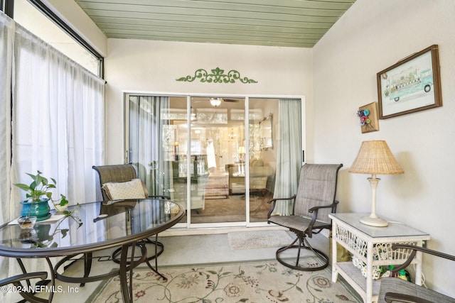 living area with wooden ceiling