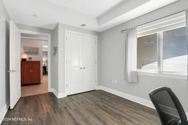 office with dark hardwood / wood-style floors