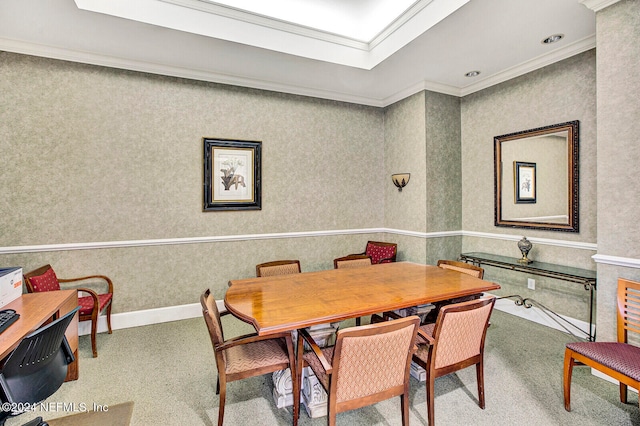 dining room featuring carpet flooring and ornamental molding