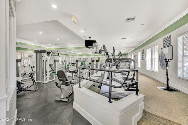 gym with ornamental molding