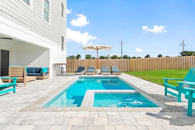 view of swimming pool with outdoor lounge area and a patio area