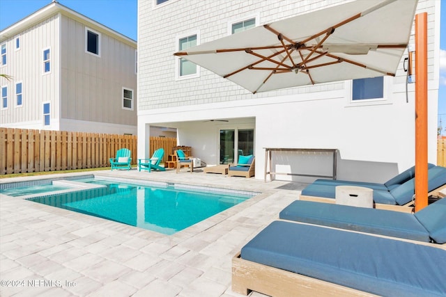 view of pool featuring outdoor lounge area and a patio area