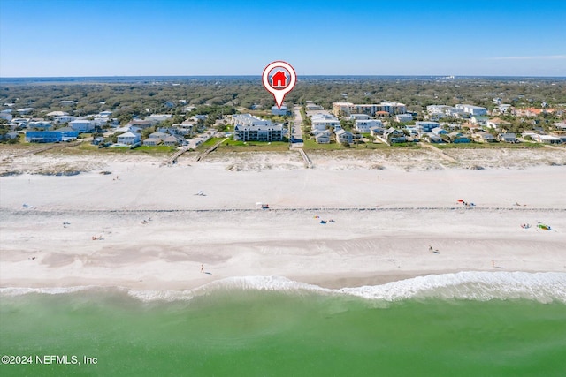 drone / aerial view with a view of the beach and a water view