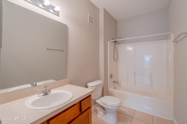 full bathroom with tile patterned flooring, vanity, toilet, and shower / washtub combination