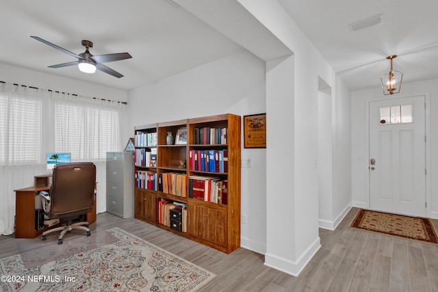 entryway with light wood-type flooring and ceiling fan