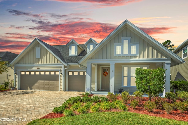 view of front of property featuring a garage