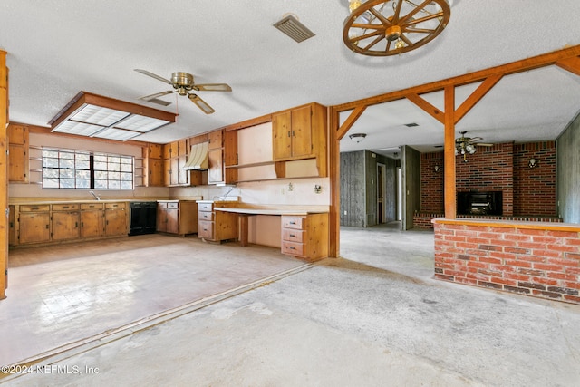 kitchen featuring a fireplace, ceiling fan, a textured ceiling, and custom exhaust hood