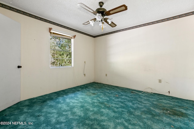 unfurnished room with carpet flooring, a textured ceiling, ceiling fan, and ornamental molding