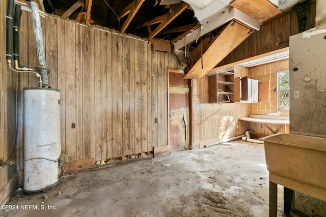 basement featuring gas water heater