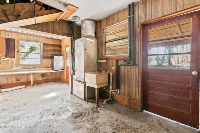 kitchen featuring wooden walls