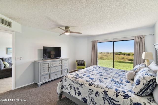 bedroom with access to exterior, ceiling fan, light carpet, and a textured ceiling