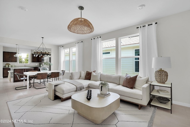 living room with light tile patterned flooring