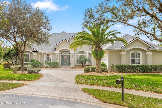 view of front of home with a front yard