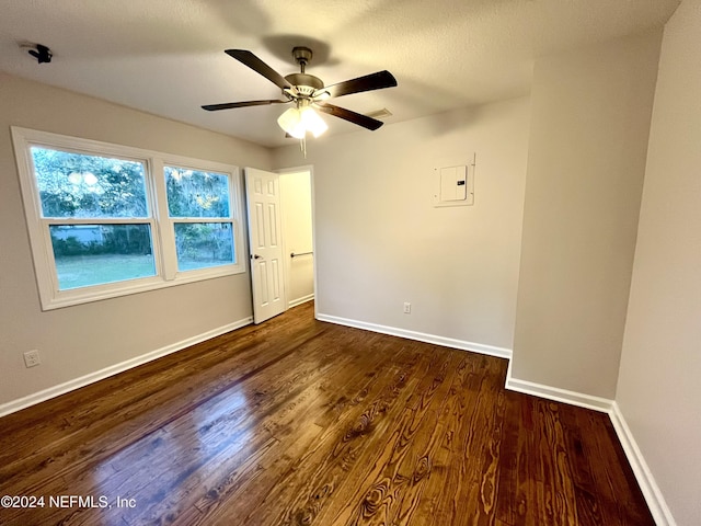 2414 Crill Ave, Palatka, FL 32177 - empty room featuring wood finished floors, baseboards, a ceiling fan, and electric panel