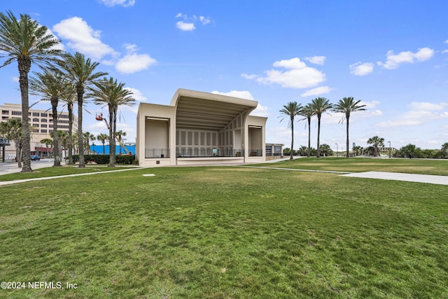 view of home's community featuring a lawn